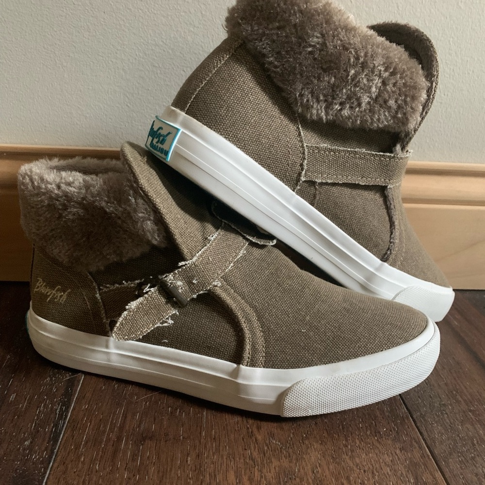 BlowFish hi top sneaker work faux fur trim and buckle.